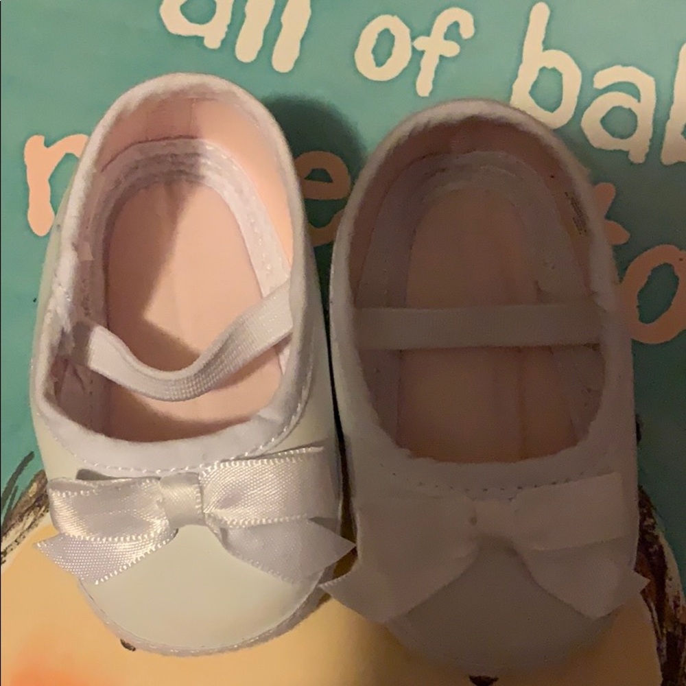 White patent leather baby shoes